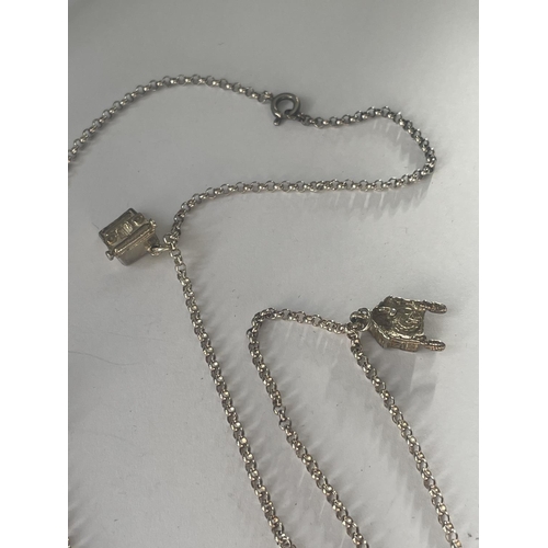 605 - A SILVER CHARM NECKLACE