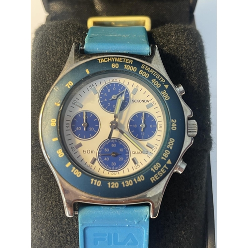 613 - A SEKONDA WATCH WITH FILA STRAP IN A PRESENTATION BOX SEEN WORKING BUT NO WARRANTY