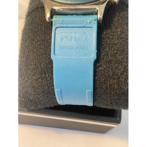 613 - A SEKONDA WATCH WITH FILA STRAP IN A PRESENTATION BOX SEEN WORKING BUT NO WARRANTY