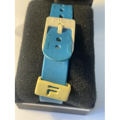 613 - A SEKONDA WATCH WITH FILA STRAP IN A PRESENTATION BOX SEEN WORKING BUT NO WARRANTY