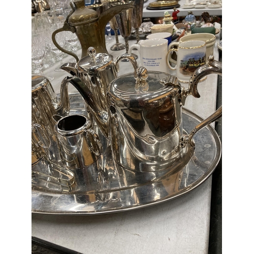 251 - A VINTAGE SILVER PLATED TEA SET AND TRAY