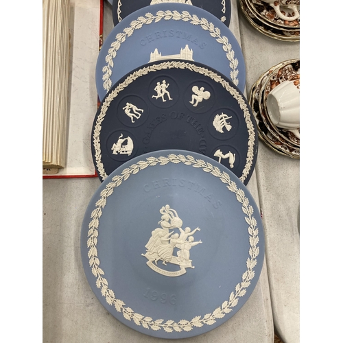 254 - A GROUP OF WEDGWOOD JASPERWARE YEAR PLATES