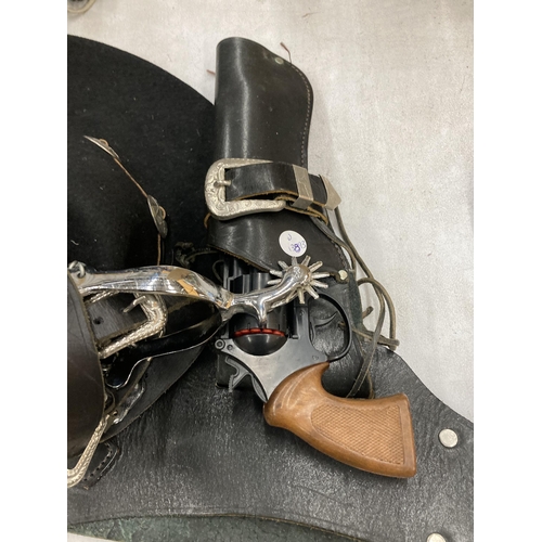 255 - A VINTAGE, MADE IN THE USA, LEATHER HOLSTER WITH REPLICA GUN AND SPURS PLUS A HAT FROM THE RANCH HOU... 