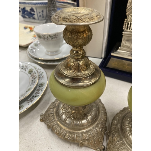 261 - A PAIR OF VINTAGE SILVER PLATED AND ONYX CANDLESTICKS