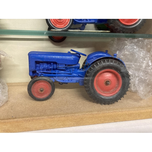 346 - A QUANTITY OF CRENSENT TOYS IN A CABINET TO INCLUDE TEN FORD & SON DEXSTAR AND THREE TRAILERS