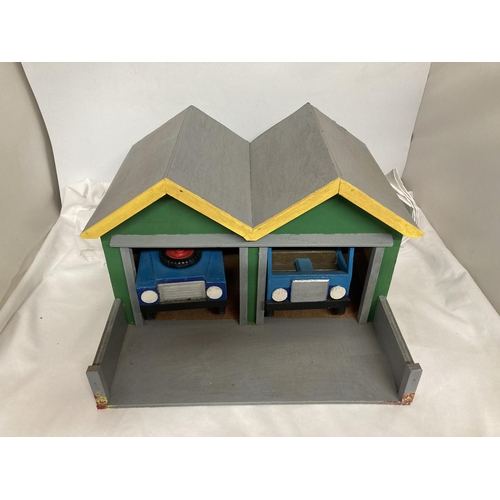 353 - A WOODEN GARAGE HOUSING A WOODEN LANDROVER AND A WOODEN LORRY