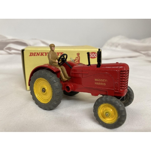 370 - TWO BOXED DINKY MODELS NO. 300 - A MASSEY HARRIS TRACTOR AND NO. 321 - A MASSEY HARRIS MANURE SPREAD... 