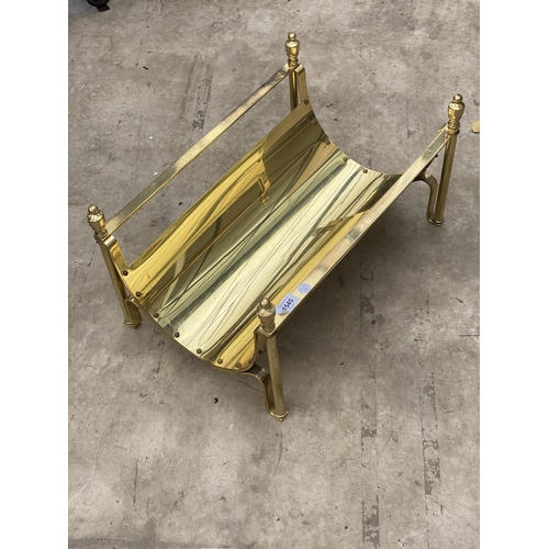 1545 - A DECORATIVE BRASS LOG RACK