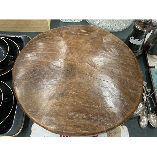 122 - A CARVED INDIAN OAK FOOTSTOOL