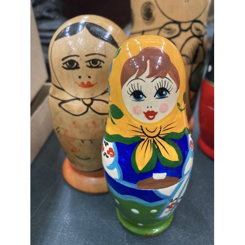 128 - A COLLECTION OF RUSSIAN DOLLS - 7 IN TOTAL