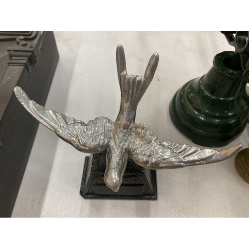 156 - A VINTAGE WHITE METAL MODEL OF A SWIFT CAR MASCOT ON A BASE, HEIGHT 14CM