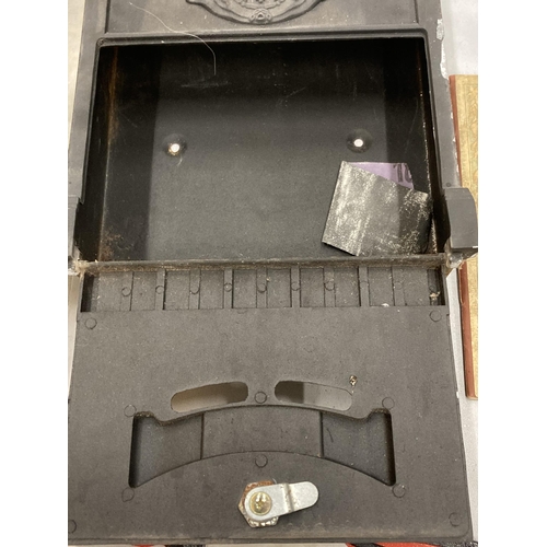 159 - A BLACK METAL WALL MOUNTED LETTER BOX WITH COAT OF ARMS AND KEY