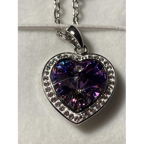 631 - A BOXED SWAROWSKI NECKLACE WITH PURPLE HEART STONE PENDANT