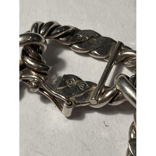 648 - A SILVER ROPE LINK BRACELET