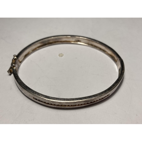 675 - TWO SILVER BANGLES