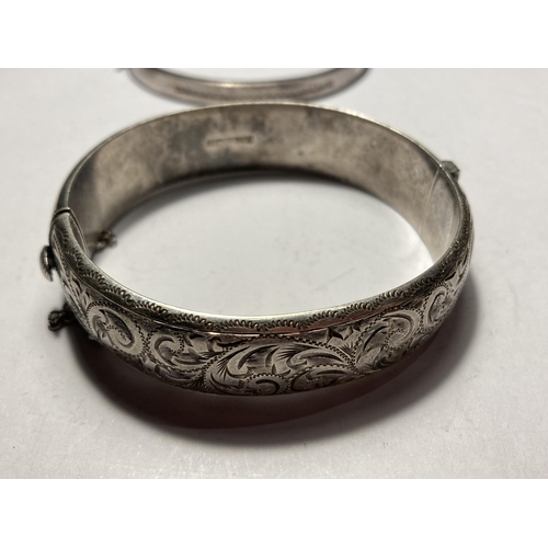 675 - TWO SILVER BANGLES