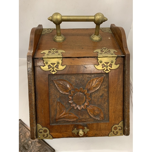 18 - A VINTAGE OAK COAL BOX WITH BRASS FITTINGS AND HANDLE WITH CARVED FLORAL DESIGN, WITH ORIGINAL LINER... 