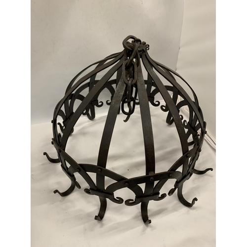 46 - A CAST METAL HANGING GARDEN LANTERN