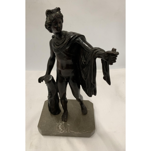 63 - A BRONZE FIGURE OF A MALE ON A MARBLE BASE