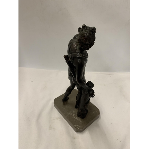 63 - A BRONZE FIGURE OF A MALE ON A MARBLE BASE