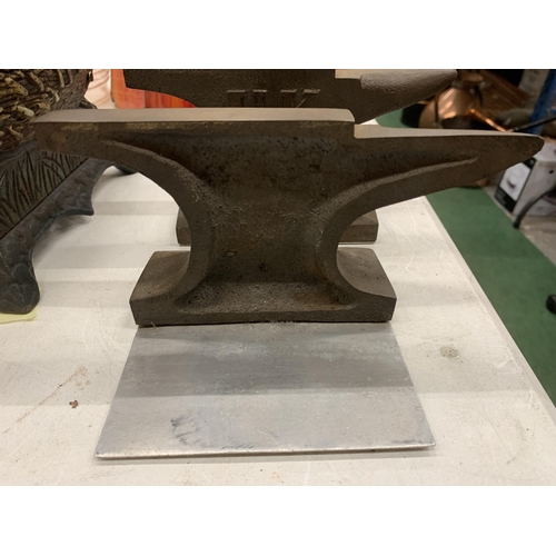 164 - A PAIR OF CAST ANVIL BOOK-ENDS