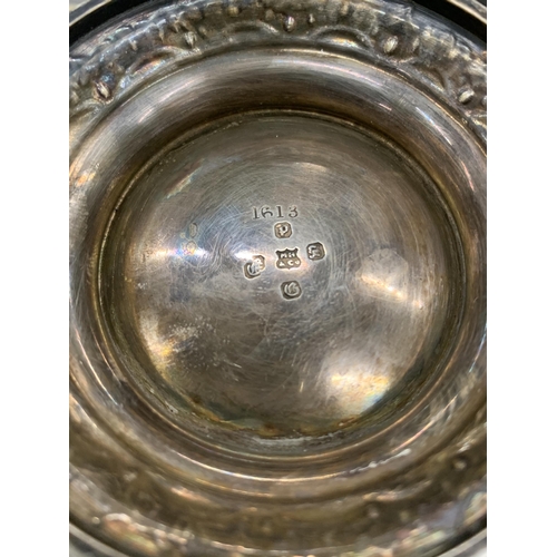 169 - A SILVER PLATED ORNATELY DECORATED TANKARD, TWO SILVER PLATED OPEN SALTS AND A WHITE METAL POST BOX ... 