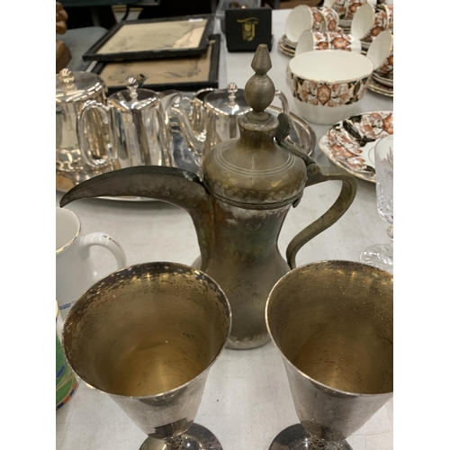 234 - FOUR LARGE PLATED WINE GOBLETS, A GLASS CRUET SET ON PLATED BASE, FISH KNIFE AND A TURKISH STYLE BRA... 