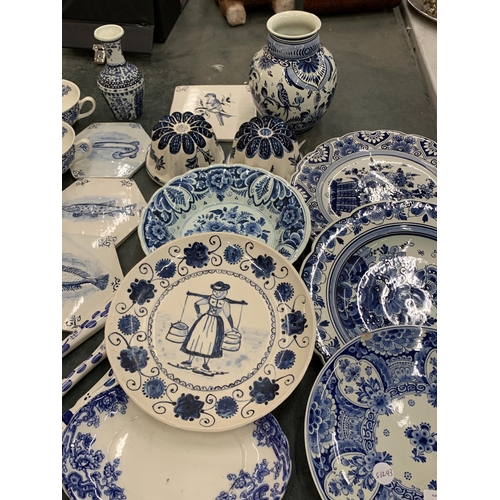 236 - A LARGE QUANTITY OF BLUE AND WHITE CERAMICS TO INCLUDE FISH TILES, SOUP COUPES, JELLY MOULDS, PLATES... 