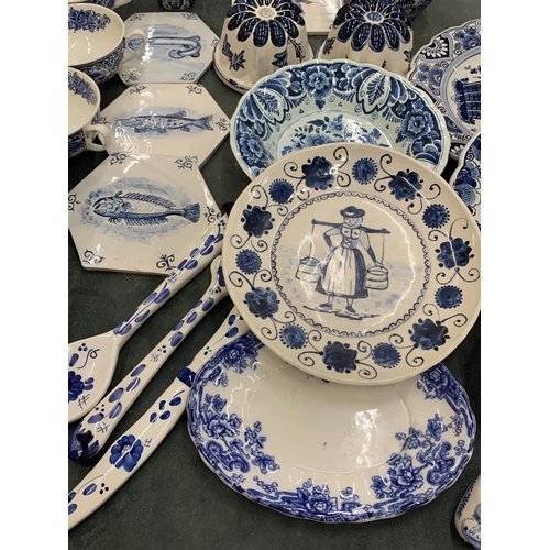 236 - A LARGE QUANTITY OF BLUE AND WHITE CERAMICS TO INCLUDE FISH TILES, SOUP COUPES, JELLY MOULDS, PLATES... 