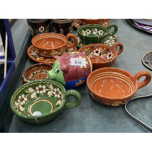 818 - A COLLECTION OF POTTERY DECORATED IN A 'BARGE ART' STYLE TO INCLUDE A PIGGY BANK, PLANTERS, CUPS, SA... 