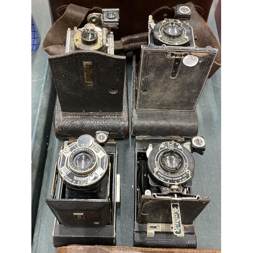 822 - FOUR VINTAGE KODAK BELLOWS CAMERAS WITH TWO LEATHER CASES