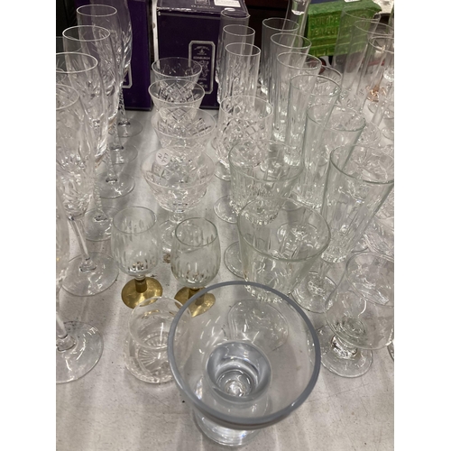 835 - A VERY LARGE QUANTITY OF GLASSES, SOME CUT GLASS, TO INCLUDE CHAMPAGNE FLUTES, WINE, SHERRY, PORT, B... 