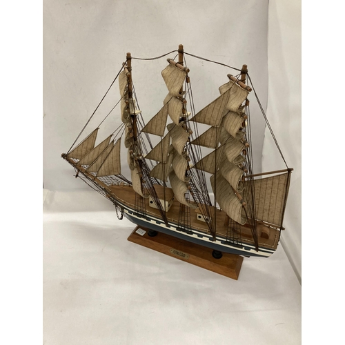 853 - TWO WOODEN MODELS OF SAILING SHIPS, HEIGHTS 45CM AND 35CM, LENGTHS 51CM AND 35CM