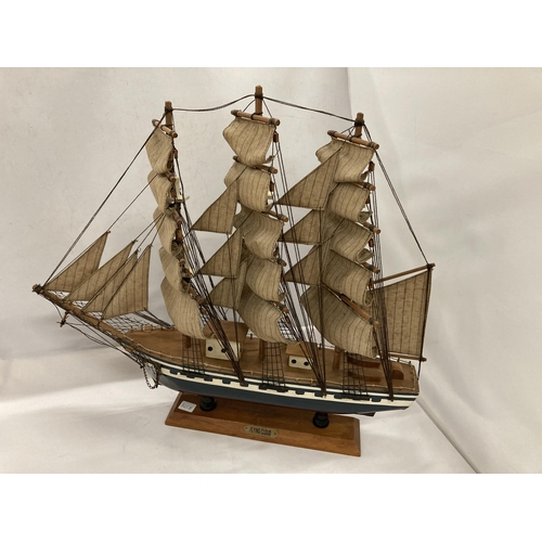 853 - TWO WOODEN MODELS OF SAILING SHIPS, HEIGHTS 45CM AND 35CM, LENGTHS 51CM AND 35CM