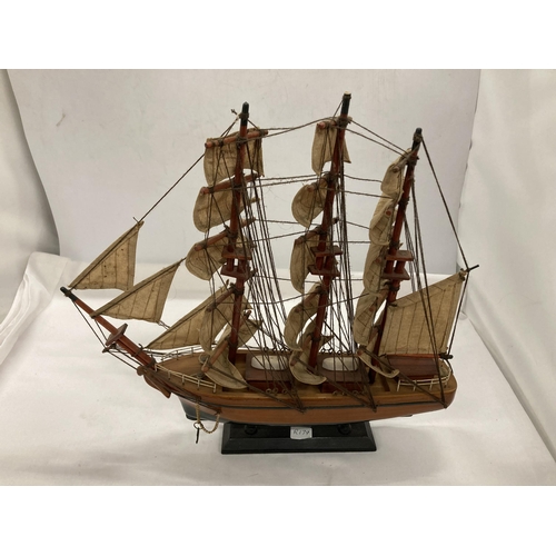 853 - TWO WOODEN MODELS OF SAILING SHIPS, HEIGHTS 45CM AND 35CM, LENGTHS 51CM AND 35CM