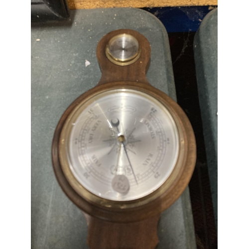 861 - A WOODEN CASED BAROMETER WITH THERMOMETER