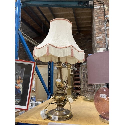 888 - A LARGE BRASS TABLE LAMP WITH SHADE