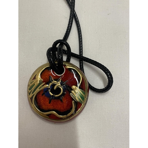 783 - AN ANITA HARRIS HAND PAINTED AND SIGNED IN GOLD BOXED POPPY PENDANT