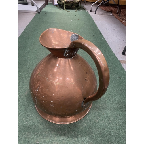 83 - A LARGE VINTAGE COPPER JUG