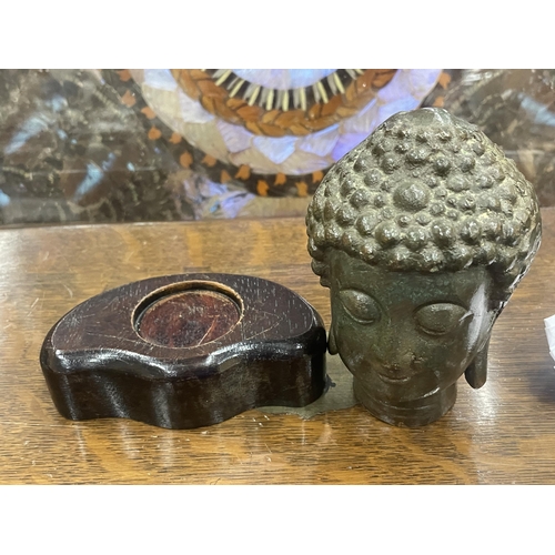 85 - A BRONZE EFFECT BUDDHA HEAD MODEL ON WOODEN BASE