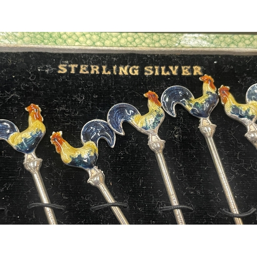 90 - A CASED SET OF STERLING SILVER AND ENAMEL COCKEREL COCKTAIL STICKS