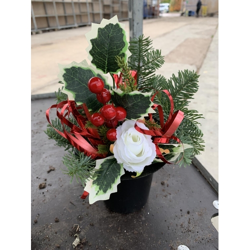 113 - SIXTEEN GRAVE POTS WITH FIR, HOLLY CONES AND RIBBON + VAT TO BE SOLD FOR THE FIVE