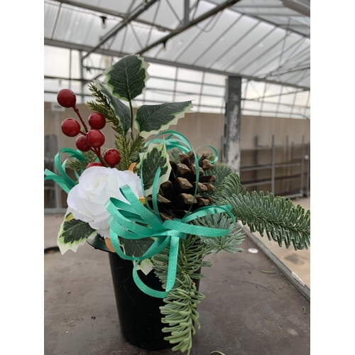 116 - SIXTEEN GRAVE POTS WITH FIR, HOLLY CONES AND RIBBON + VAT TO BE SOLD FOR THE FIVE