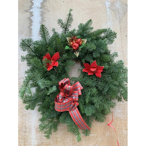 122 - FIVE LARGE WREATHS WITH POINSETTIA AND TARTAN RIBBON + VAT. TO BE SOLD FOR THE FIVE