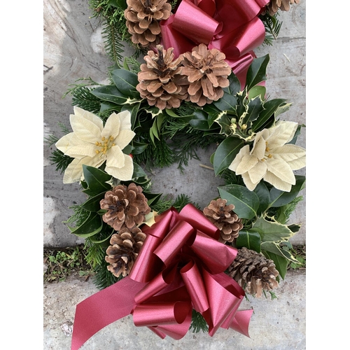 124 - FOUR WREATHS WITH CREAM POINSETTIA, CONES AND RED/BURGUNDY RIBBON + VAT. TO BE SOLD FOR THE FOUR