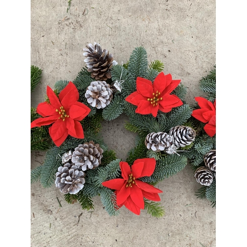 138 - FIVE WREATHS WITH FIR, POINSETTIA/CHRISTMAS ROSE AND CONES + VAT. TO BE SOLD FOR THE FIVE