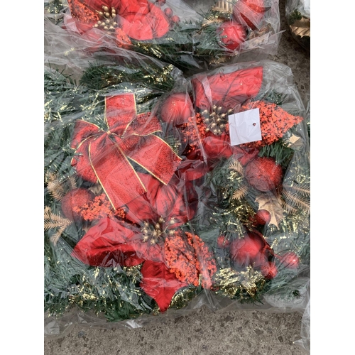 154 - SIX ARTIFICIAL WREATHS IN RED AND GOLD WITH BOW AND POINSETTIA + VAT TO BE SOLD FOR THE SIX