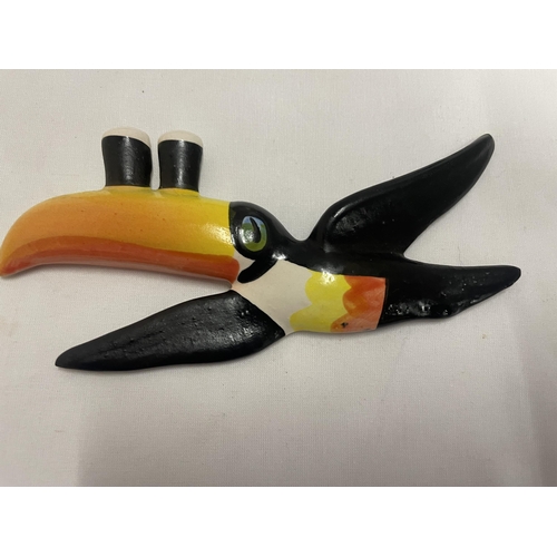 768 - A SET OF THREE GRADUATED CARLTON WARE GUINNESS TOUCANS IN FLIGHT WALL HANGING DECORATIONS