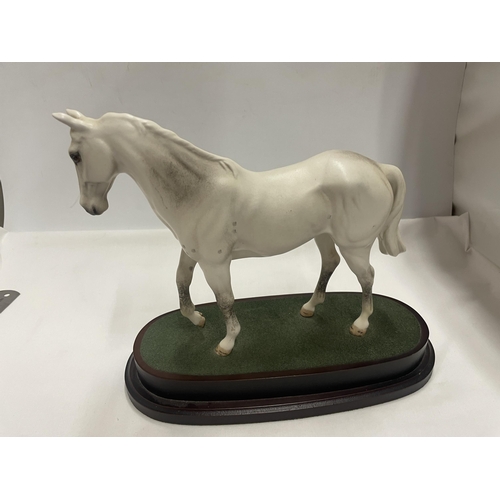 772 - A ROYAL DOULTON DESERT ORCHID FIGURE ON A PLINTH (SECOND)