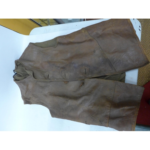 421 - A WORLD WAR II BRITISH ARMY LEATHER JERKIN DATED DECEMBER 1942